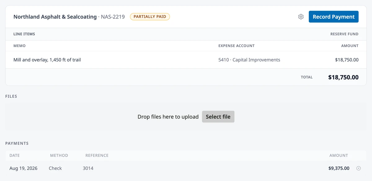 A partially paid bill with the gear icon and Record Payment in its header, and one check payment listed under Payments.
