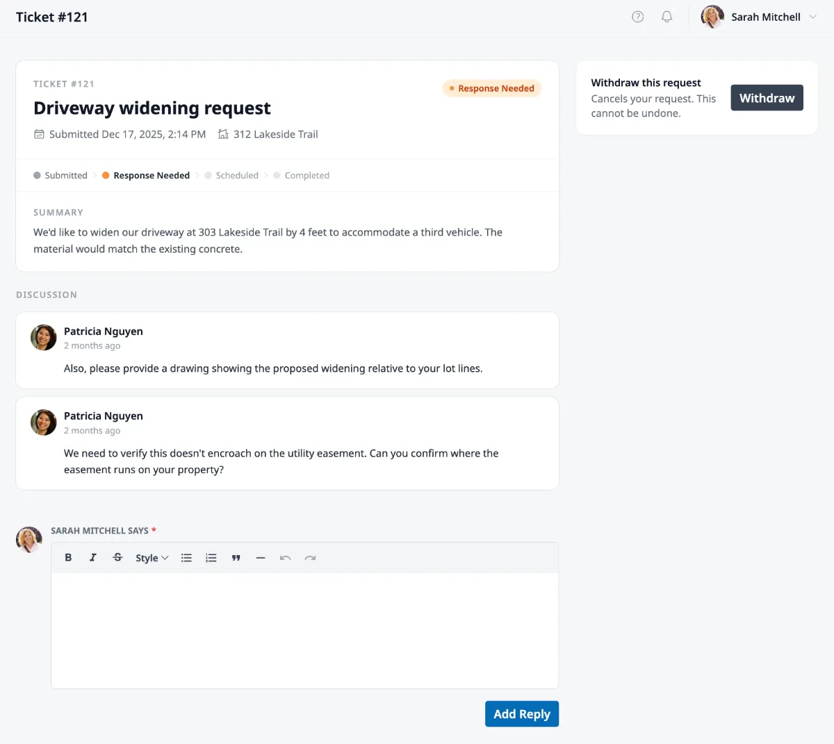 A ticket detail page showing the ticket header, status badge, progress bar, summary, discussion thread, and the reply editor with Add Reply button.